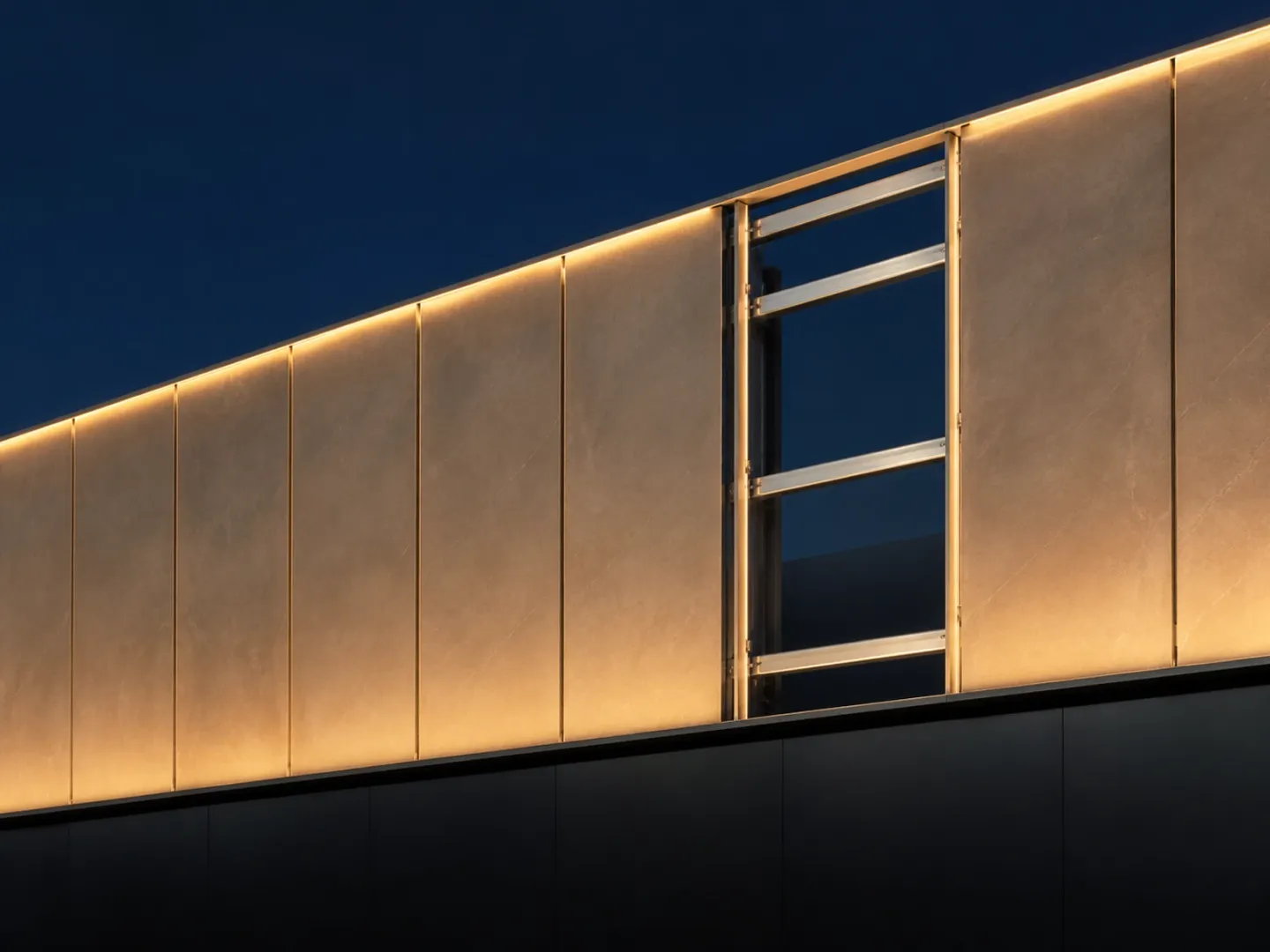 Thin facade panels with a slender aluminium subframe exposed at one open bay.