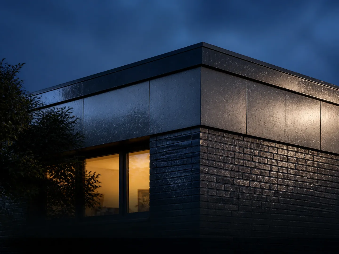 Rain-washed brick and porcelain-panel facade with a glowing entrance at dusk.